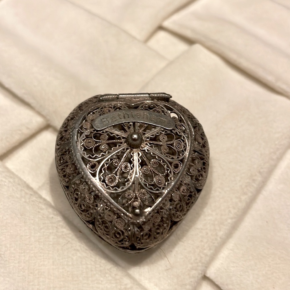 Heart silver filigree pill box with “Bethlehem” on top.